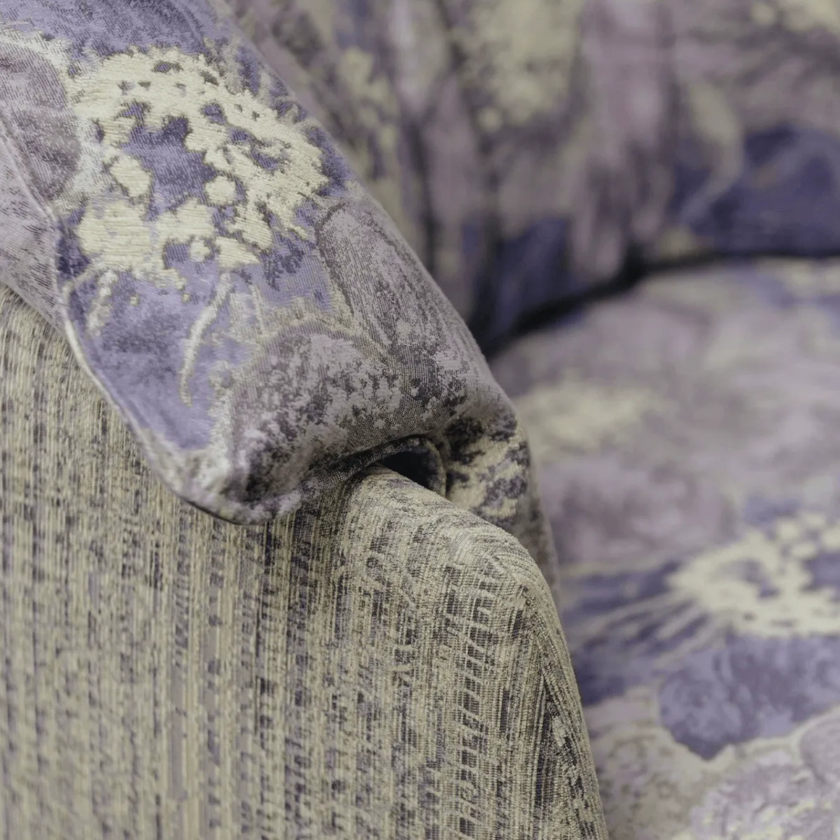 Violet Floral Accent Armchair with Embracing Curves and Retro Lounge Appeal