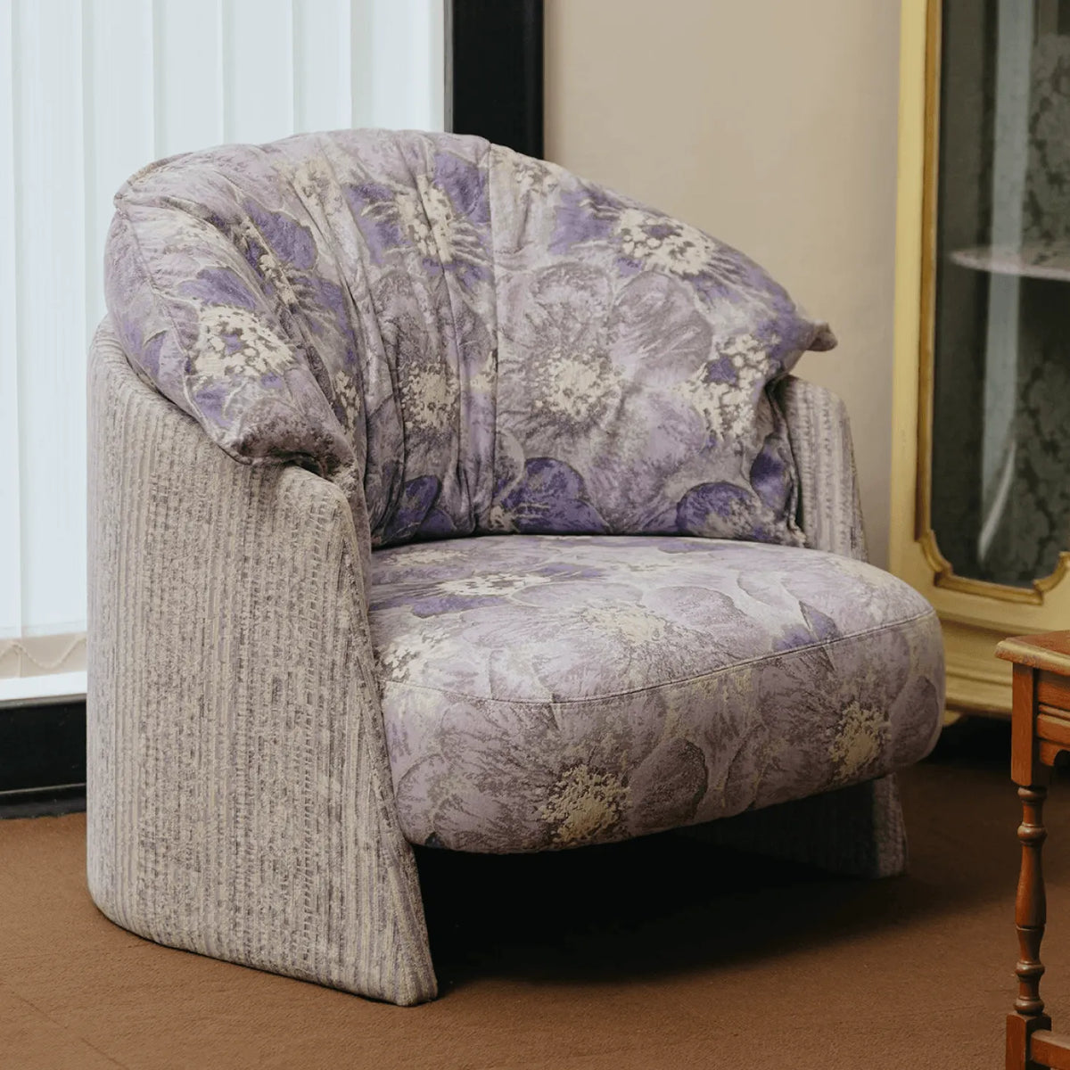 Violet Floral Accent Armchair with Embracing Curves and Retro Lounge Appeal