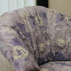 Violet Floral Accent Armchair with Embracing Curves and Retro Lounge Appeal