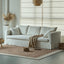 Warm White Linen Slipcover Sofa with Relaxed Skirted French Vintage Silhouette Main Product Image
