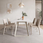 White rectangular dining table with creamy rock tabletop and carbon steel legs, Italian minimalist design