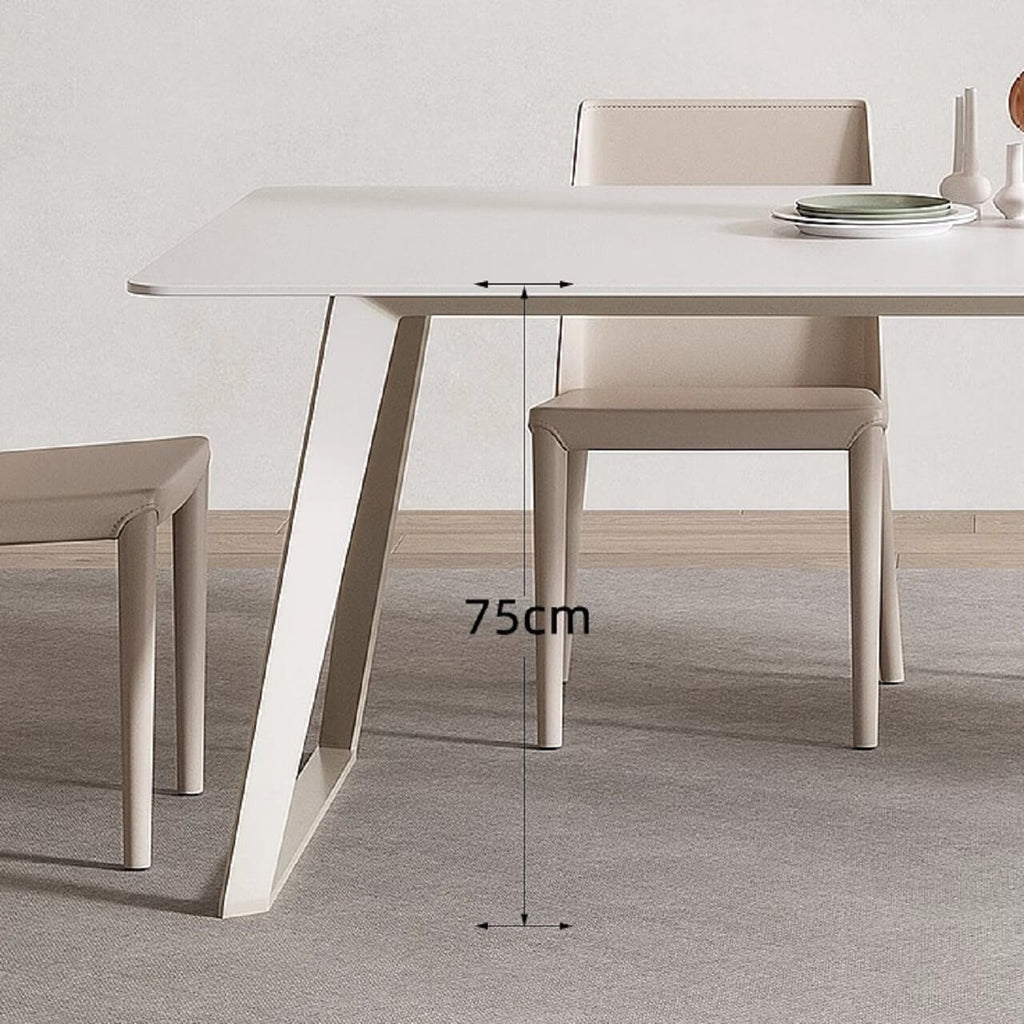 White rectangular dining table with creamy rock tabletop and carbon steel legs, Italian minimalist design