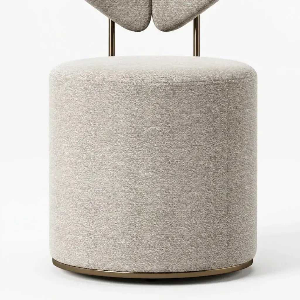 Wingback Ivory Vanity Stool with Hidden Casters and Sculptural Base