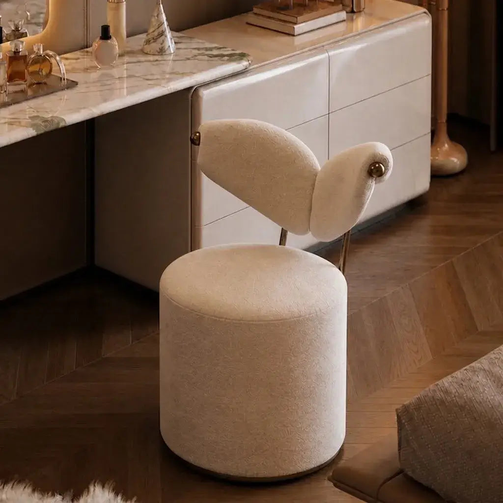 Wingback Ivory Vanity Stool with Hidden Casters and Sculptural Base Main Product Image Main image