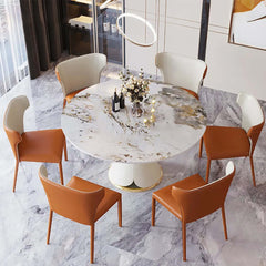 Sophisticated Round White Stonetop Dining Table with Golden Stainless Steel Base for Luxury Dining Experience