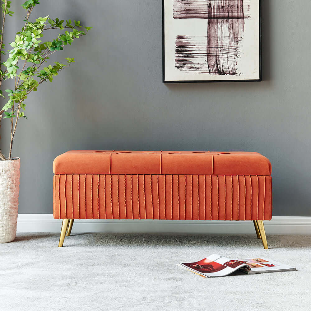 Sophisticated gray velvet bench with gold legs for luxurious interiors