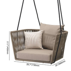 Outdoor rattan swing chair with modern design and cozy khaki cushion pillow