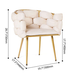 Stylish beige velvet armchair with gold-finished legs for luxurious home decor