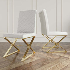 Stylish set of 2 upholstered dining chairs in black leather with radiant gold legs - modern design