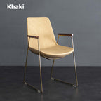 Luxurious black PU leather dining chair with gold legs for contemporary dining spaces