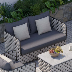 Black patio sofa with cushions for comfortable outdoor seating