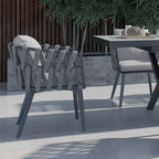 Outdoor dining set with extendable ceramic table and woven aluminum armchairs, 7 pieces