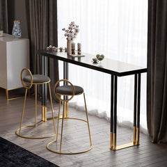 Sophisticated gray velvet counter height bar stool with low backrest and elegant gold-colored legs