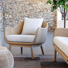 Outdoor armchair with rope woven design, solid wood frame, and khaki cushion pillow