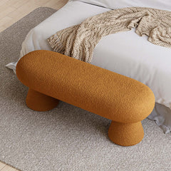 Stylish white and orange boucle bedroom bench with 2 legs perfect for extra seating