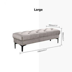 Luxurious light gray velvet tufted entryway bench supported by strong metal legs