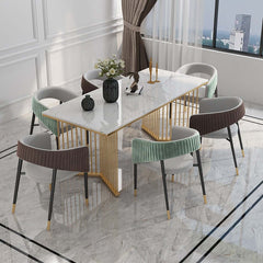 Elegant green upholstered dining chair with modern metal accent, luxury furniture