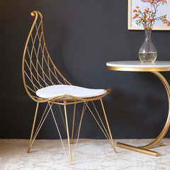 Gold finish modern metal dining chair with hollow design and comfortable PU leather cushion