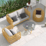 4 Pieces Rattan Outdoor Sofa Set with Glass Top Coffee Table and Cushions in Yellow