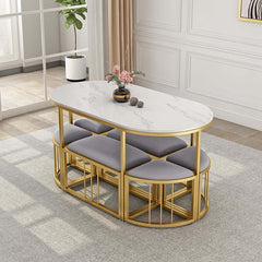 Contemporary oval dining table set with white stone top and metal frame for modern dining area