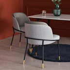 Gray upholstered armchair set with linen cushion