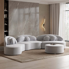 Beige velvet upholstered 7-seat sofa with round sectional design, ottoman, and cozy throw pillows for relaxation