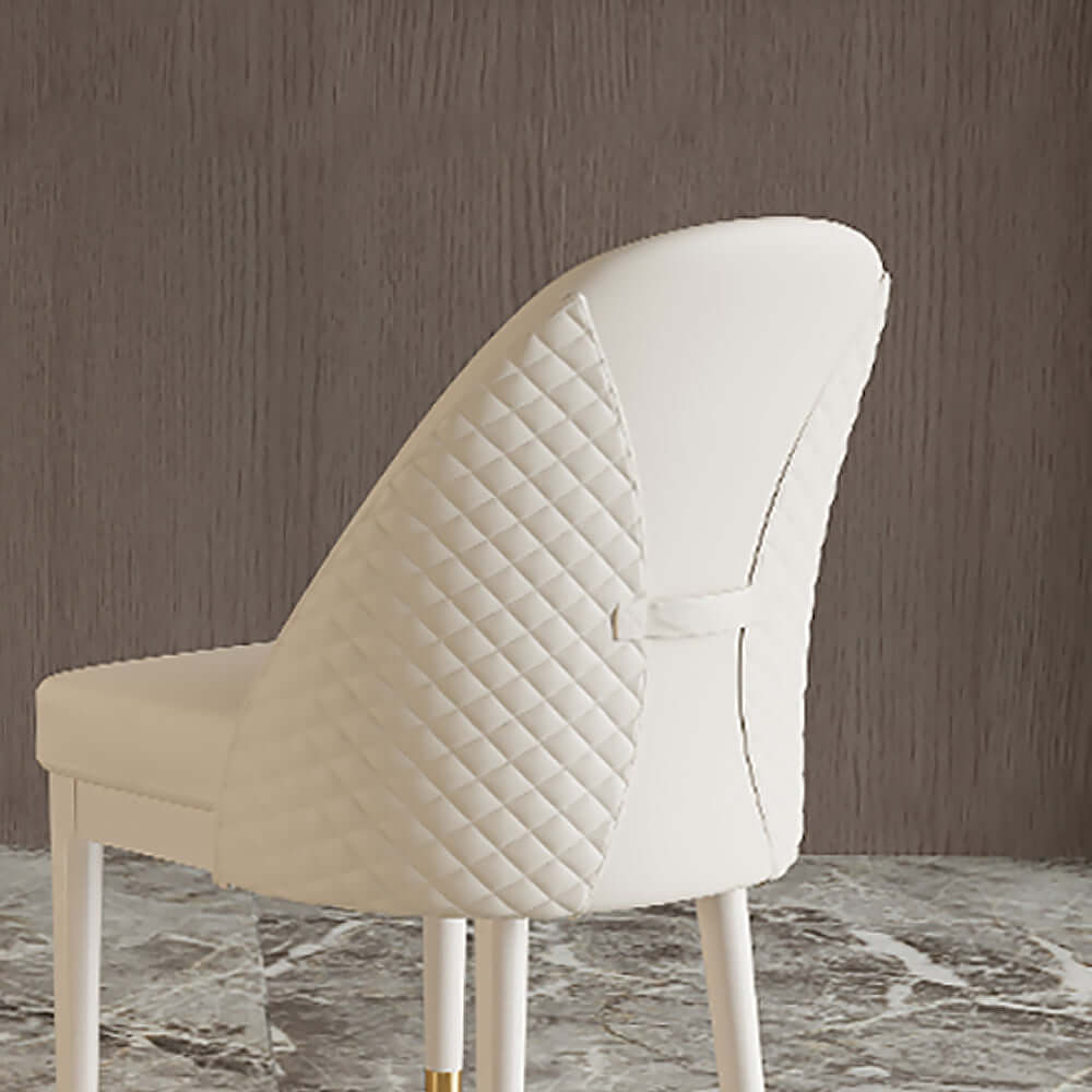 Elegant modern beige dining chair with faux leather upholstery and robust solid wood frame