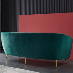 Chic emerald green velvet couch with durable metal legs for trendy living room decor