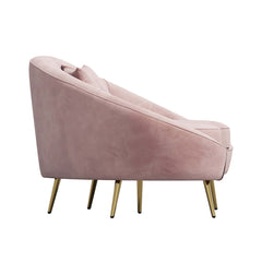 Modern pink velvet sofa with curved design, gold metal frame, and toss pillow, 63 inch length