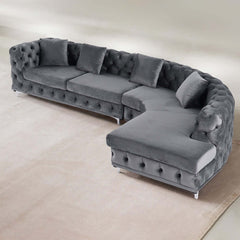 Graceful LShaped curved gray sectional sofa with velvet upholstery