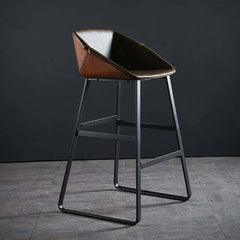 Modern faux leather bar stool with black metal frame for stylish kitchen seating