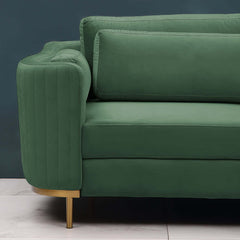 Green velvet upholstered seating set including chair, loveseat, and sofa for modern living rooms