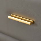 Elegant bed end bench upholstered in faux leather with storage feature