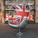 Leather upholstered swivel office chair with wing back and industrial style featuring national flag design