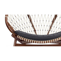 Stylish Deloris papasan chair with a broad 44.5-inch seat for contemporary interiors