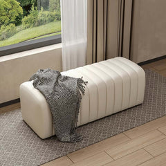 Channel tufted orange leather bench with modern design, perfect for entryway