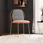 Trendy armless dining chair designed with stunning gold metal legs, exquisite side chair for sophisticated dining area