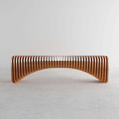 Modern wooden bench with unique curved design