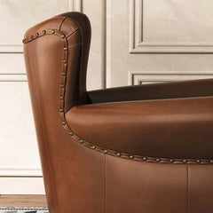 Accent chair in waxy leather upholstered, midcentury modern brown with solid wood frame