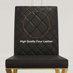 Two modern black leather dining chairs with gold legs - sleek and sophisticated seating option