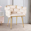 Modern beige velvet armchair with contemporary gold legs for living room decor