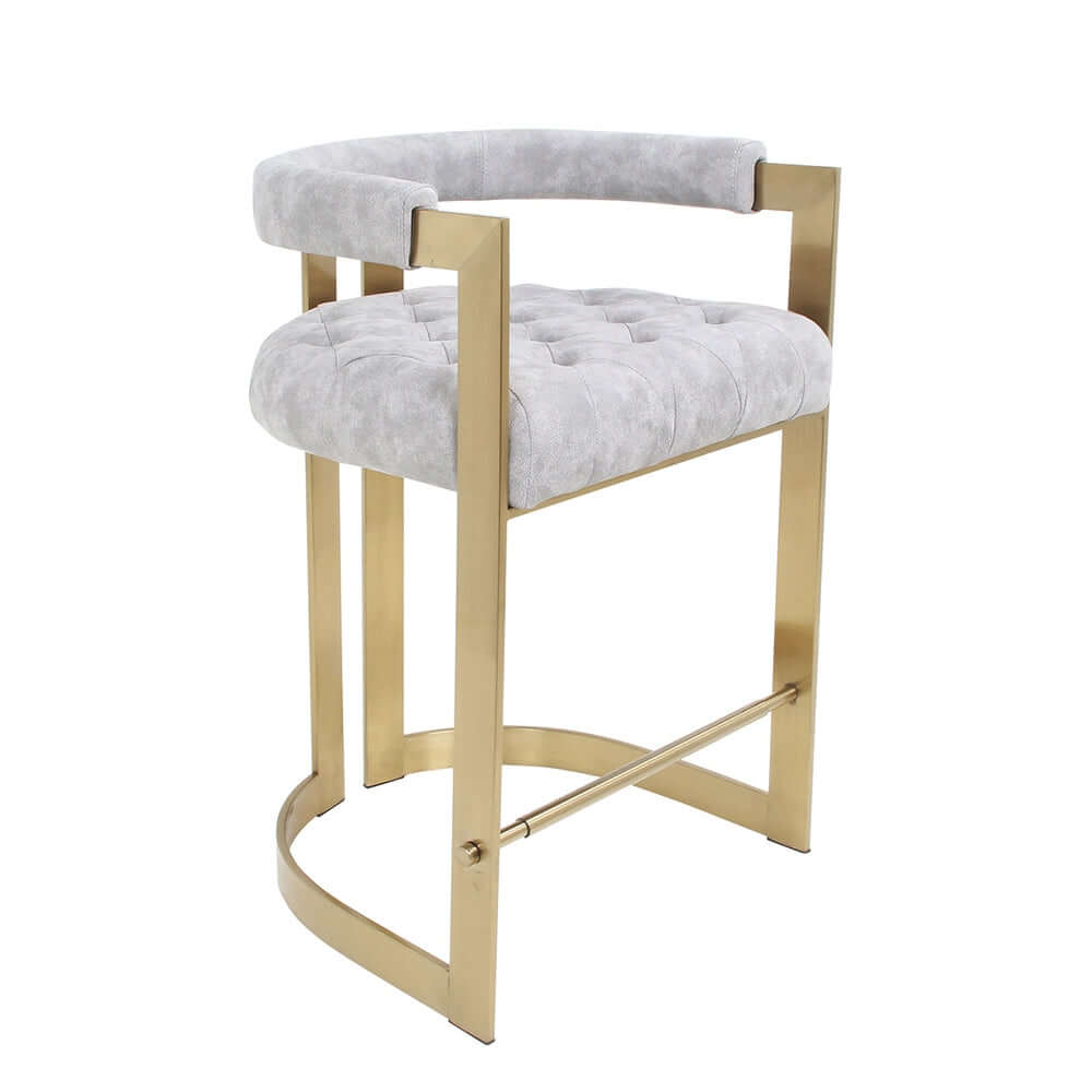 Luxurious velvet upholstered bar stool in elegant gray and gold tones