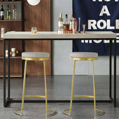 Stylish set of 2 black bar height stools with modern PU leather upholstery and comfortable round seats