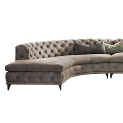 Graceful LShaped curved gray sectional sofa with velvet upholstery