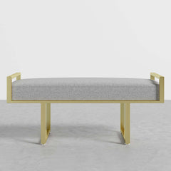 Contemporary gray upholstered bench with gold legs, great for modern bedroom and entryway decor