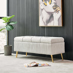 Chic velvet storage bench with gold legs for modern living spaces