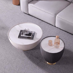 Stylish gray drum coffee table with stone round top and PU leather accent for elegant home decor