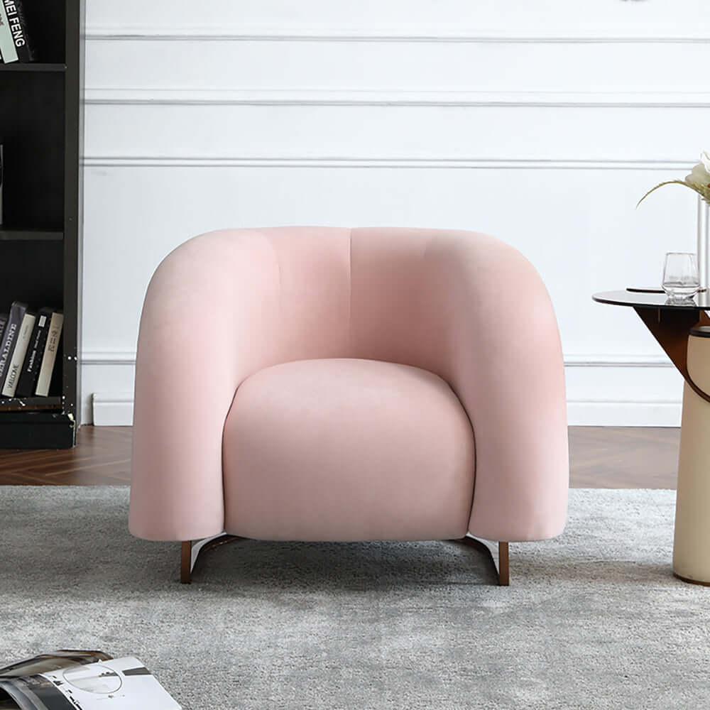 Modern yellow chair with plush velvet upholstery and metal base for cozy seating