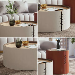 Elegant matching coffee table set with saddle leather upholstery and plywood tops