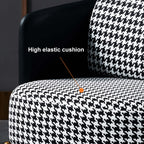 Luxe modern accent chair in black and gray with plush linen upholstery